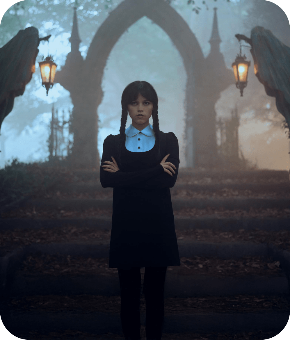Wednesday — Wednesday Addams in front of a misty cathedral arch